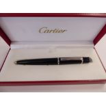 A Diabolo de Cartier rollerball pen,