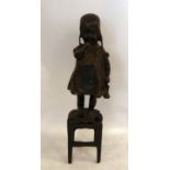 After Juan Clara - a cast and patinated bronze figure, a little girl standing on a stool,