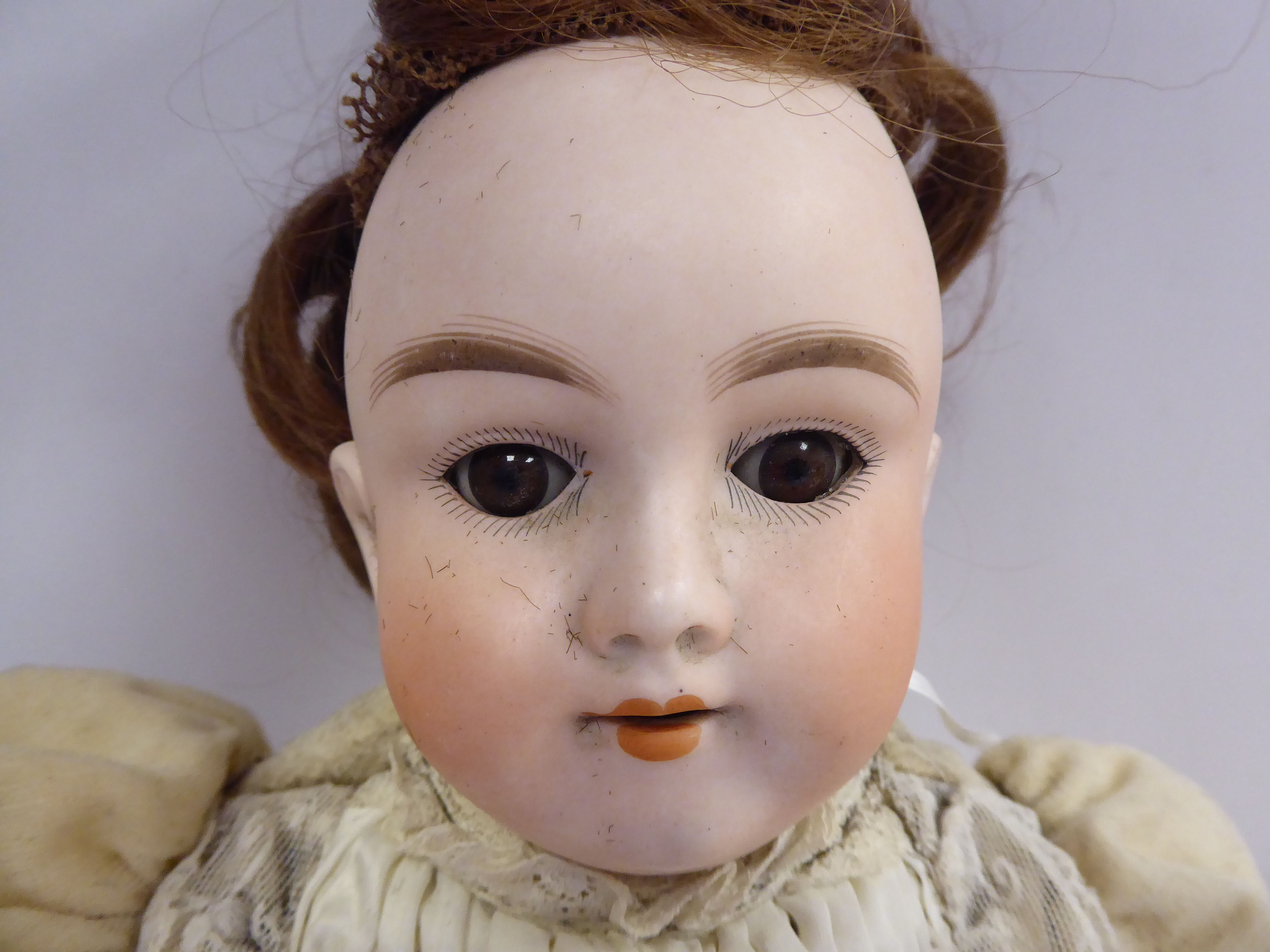 A Max Handwerck porcelain head doll with painted features and weighted, sleeping eyes, - Image 2 of 5