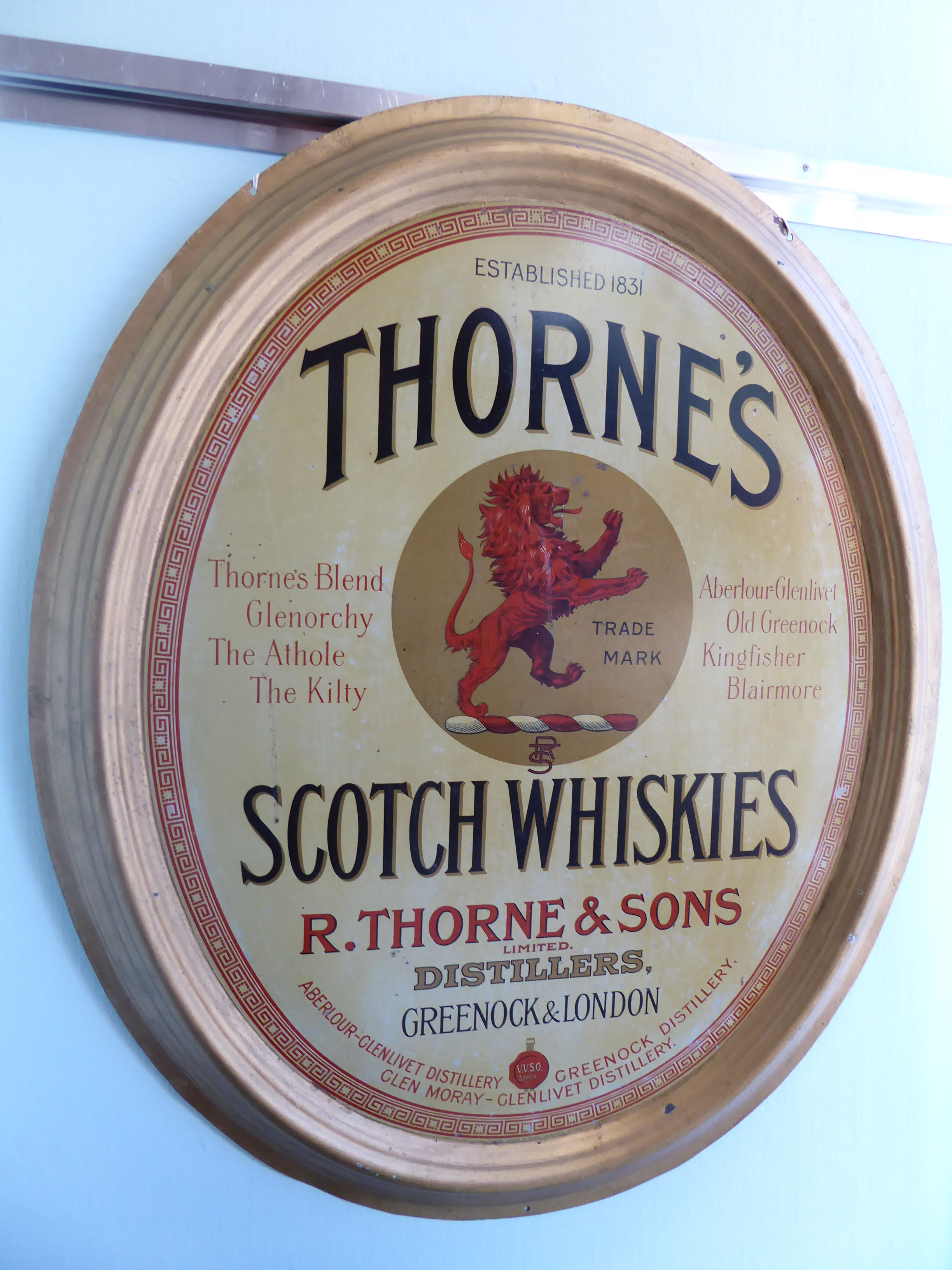 A 'vintage' press metal advertising sign for Thorne's Scotch Whiskey 35'' x 29''