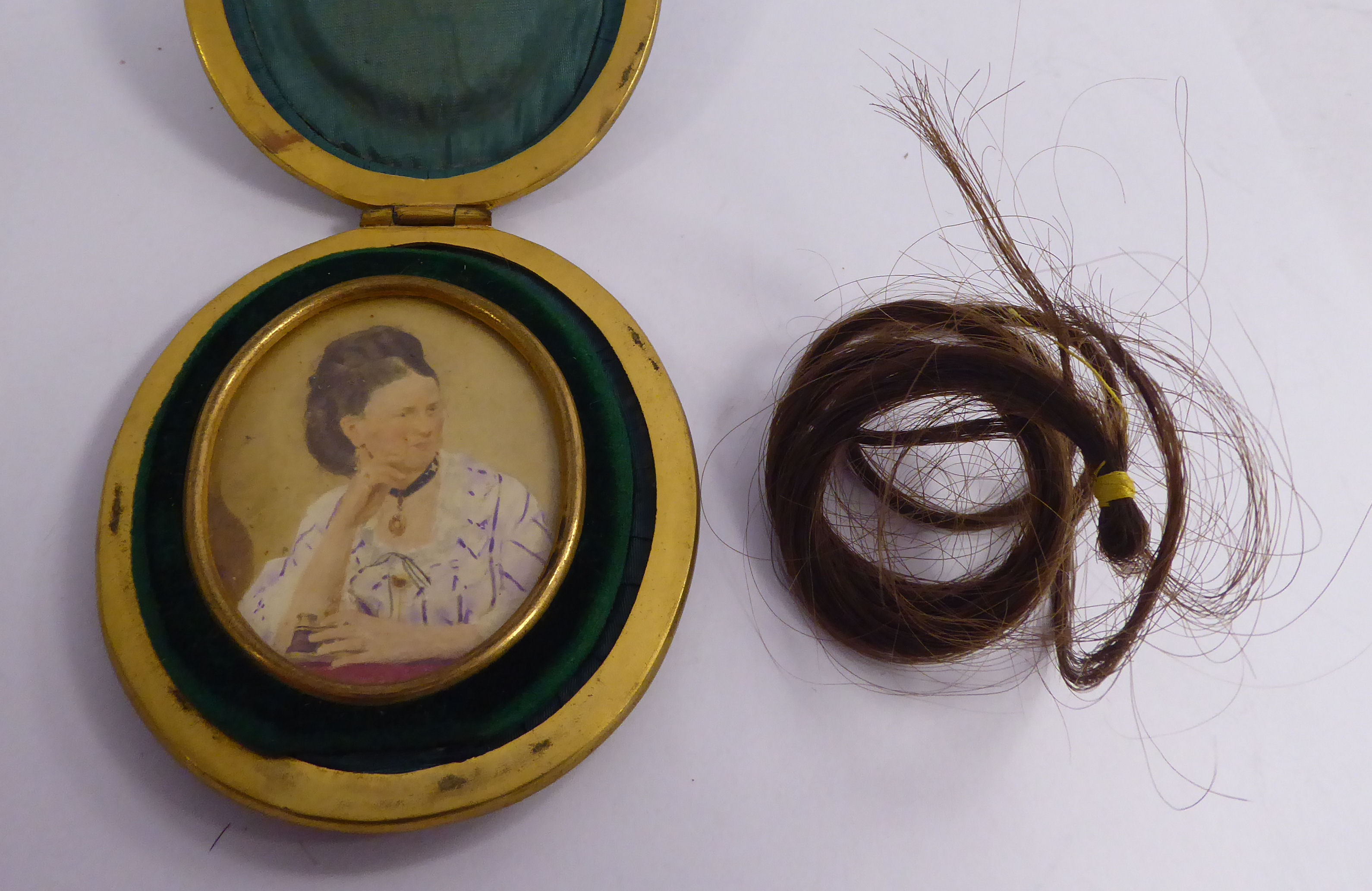 A late 19thC half-length portrait miniature, a woman holding a pair of binoculars, in a glazed, - Image 3 of 4