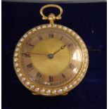 A lady's gold coloured metal and midnight blue enamel cased fob watch,