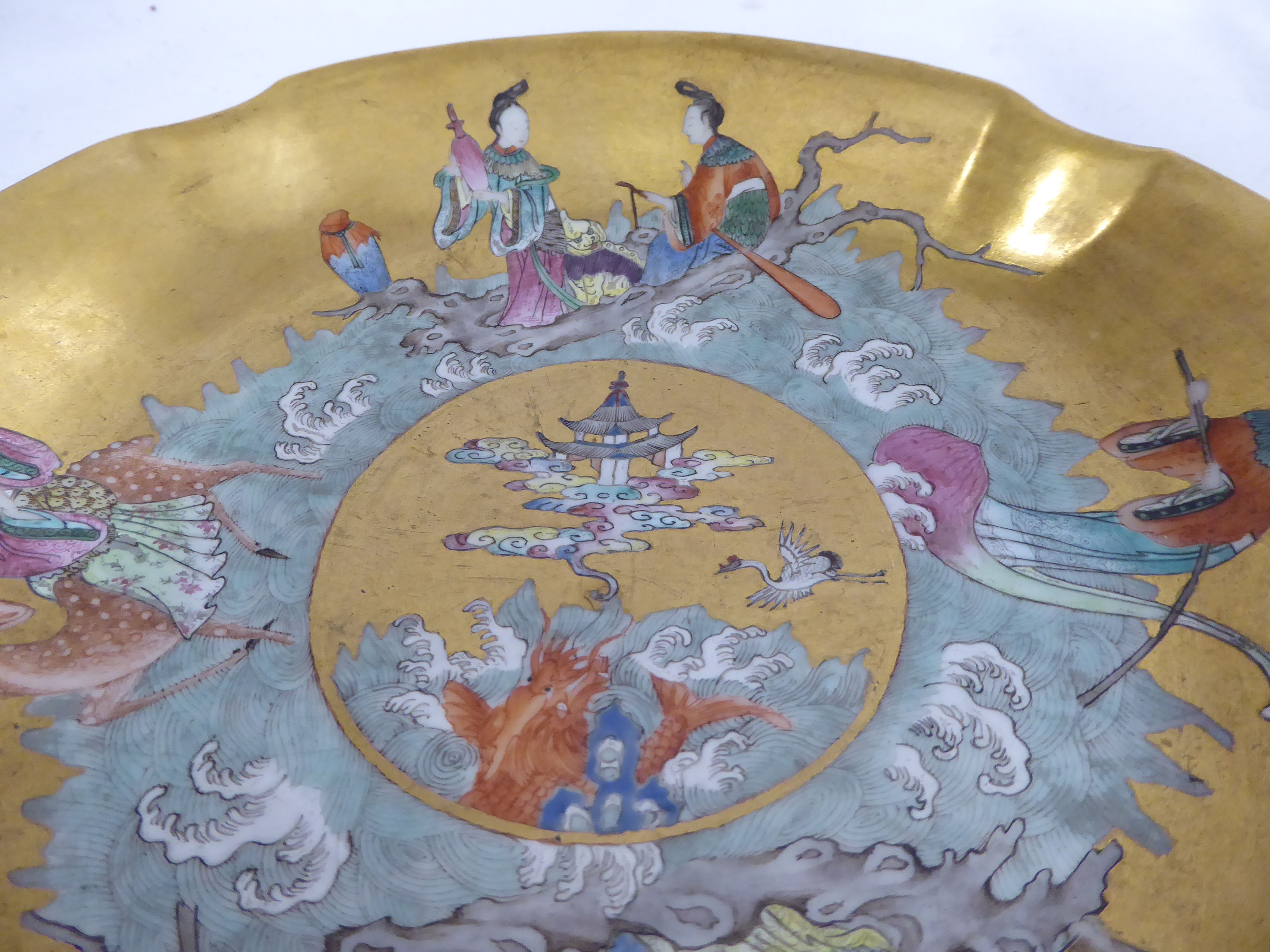 A Chinese Jiaqing period porcelain bowl, decorated with figures amongst crashing waves, - Image 2 of 14