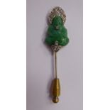 A white metal stickpin,