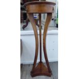 A modern Empire design mahogany jardiniere,