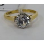 An 18ct gold claw set solitaire ring,