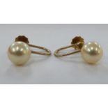 A pair of 9ct gold cultured pearl earrings 11