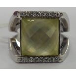 An 18ct white gold ring, set with a quartz,