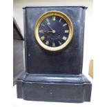 A 1930s French slate cased mantel clock,