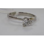 A white coloured gold, diamond solitaire ring approx. 0.