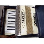 An early/mid 20thC piano accordion cased CA