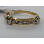 A 9ct gold and diamond set half-eternity ring 11