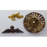 A Scottish silver brooch of floral disc design,