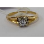 A gold coloured metal claw set solitaire ring,