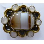 A Scottish yellow metal brooch, set with banded agate tablet,