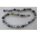 A single row of multi-coloured baroque pearls,