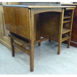 A 1930s oak three drawer single pedestal desk,