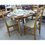 A 1960s teak dining table,