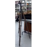 An early 20thC surveyor's stained beech tripod,