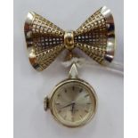A lady's 14ct bi-coloured gold Omega fob watch with a ribbon pendant,