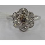A platinum floral design ring,
