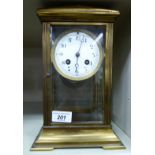 An early 20thC French four glass mantel clock,