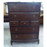 A Stag mahogany seven drawer dressing chest,