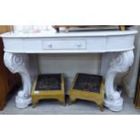A late Victorian cream painted Duchess style washstand with a single drawer,