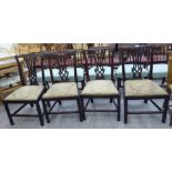 A set of four 1920s Chippendale design mahogany framed dining chairs,