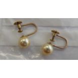 A pair of 9ct gold cultured pearl earrings 11