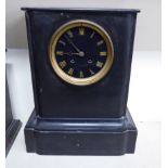 A 1930s French slate cased mantel clock,