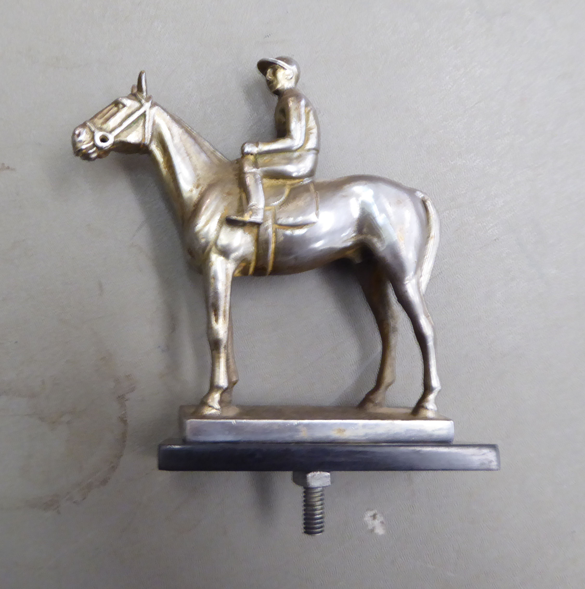 An early/mid 20thC silver plated steel car mascot, fashioned as a standing horse and jockey, - Image 2 of 2