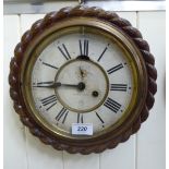 An early 20thC Ansonia oak cased wall timepiece;