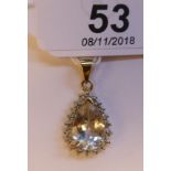A pear shaped diamond and gem set pendant 11