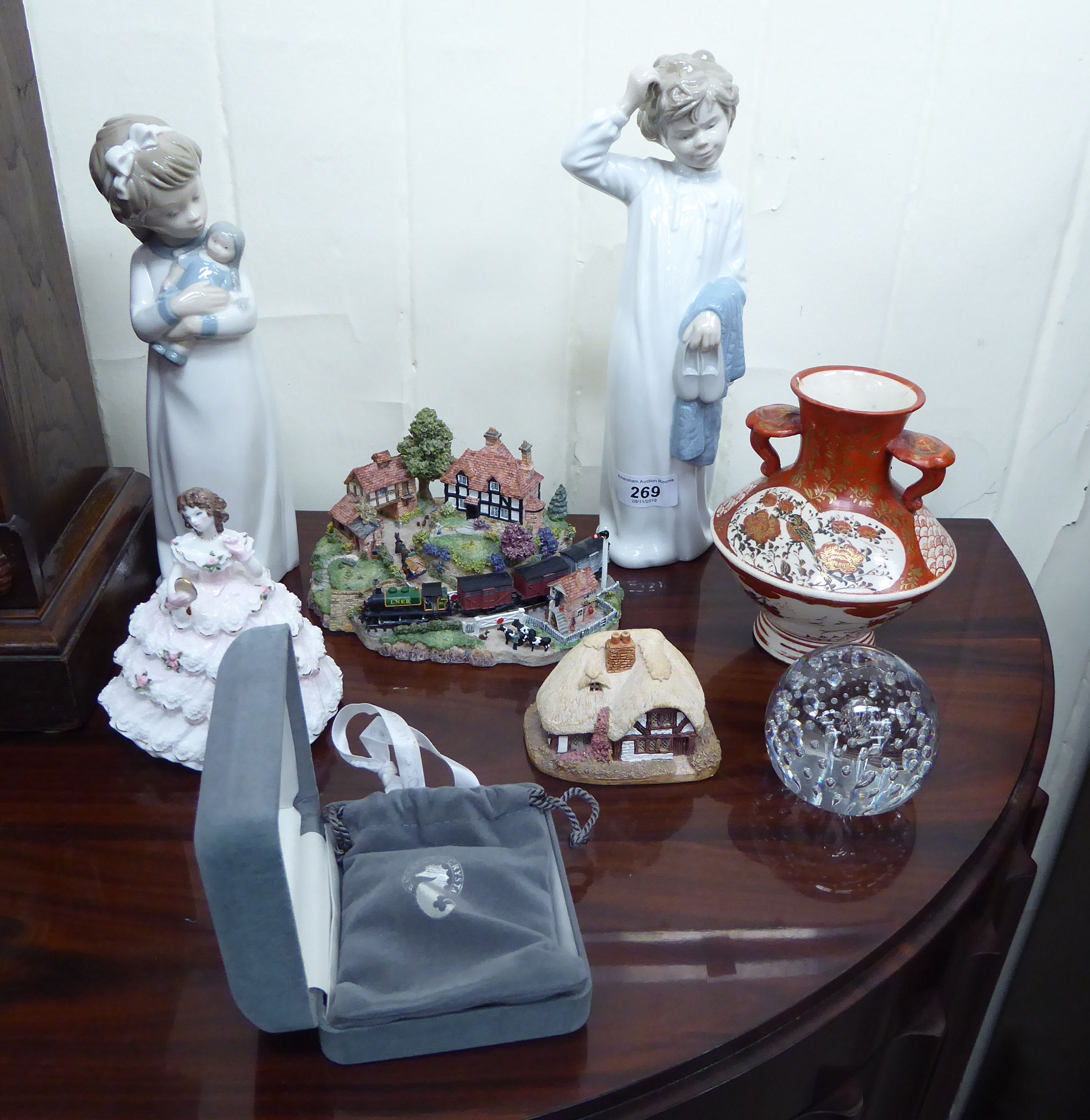 Ceramic ornaments: to include a Nao porcelain figure,