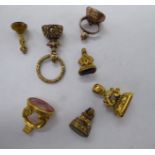 Seven various yellow metal pendant seals 11
