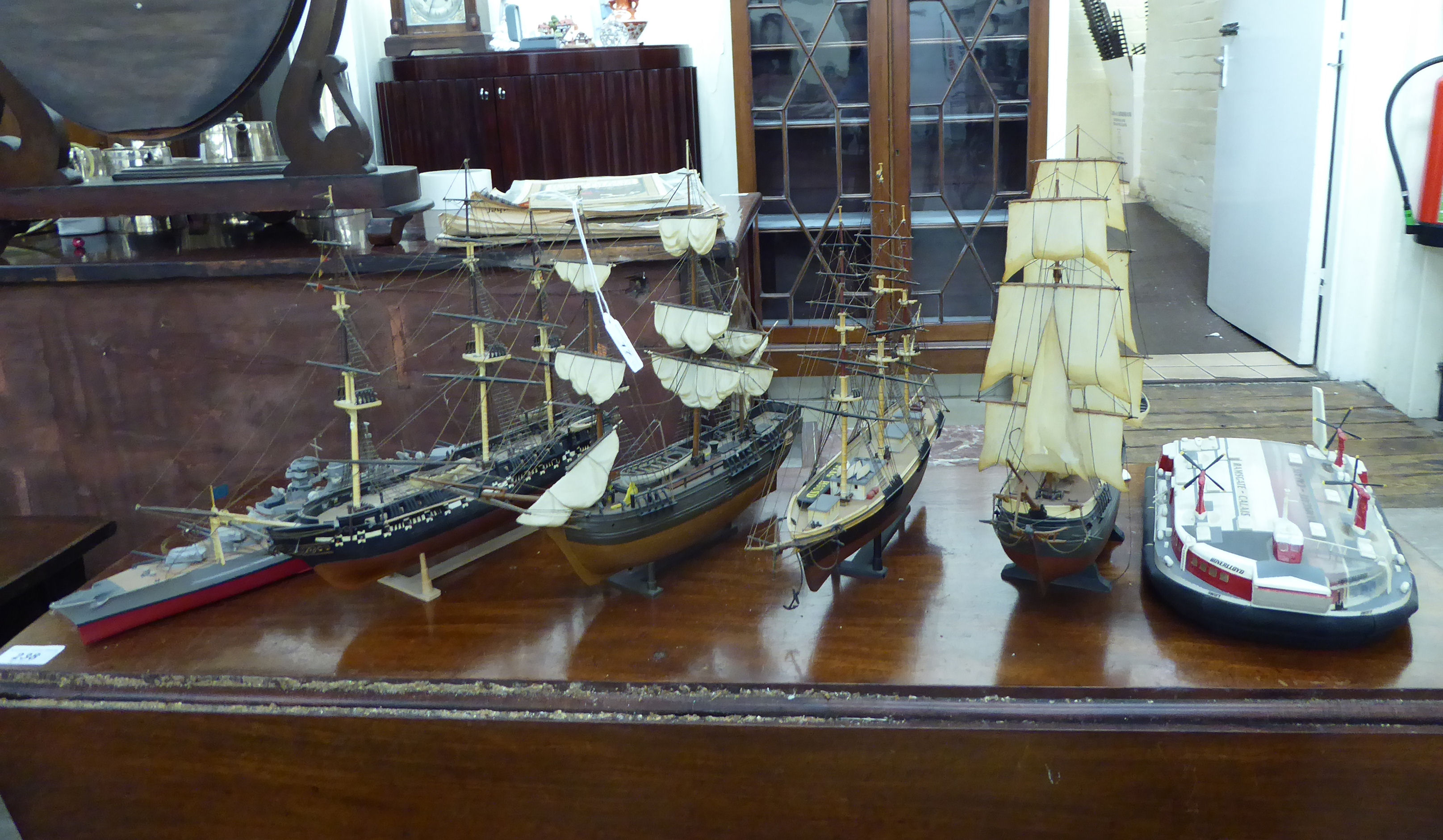 Six dissimilar painted and moulded plastic boats: to include a galleon 12''h LAM