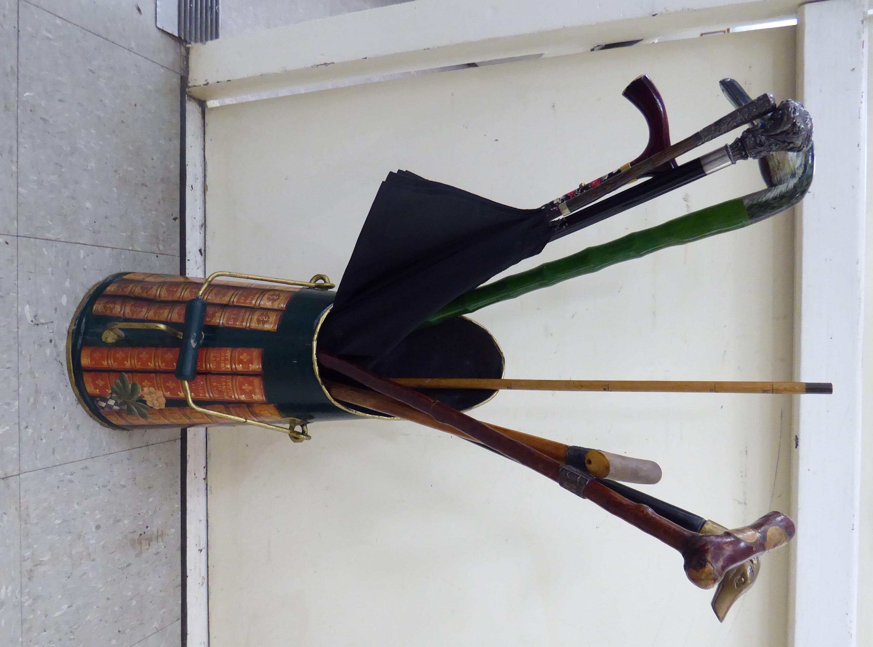 A green painted steel coal hod with strapwork decoration;