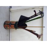 A green painted steel coal hod with strapwork decoration;