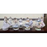 Eight Royal Worcester china figures: to include a Limited Edition 'The NSPCC Children of the