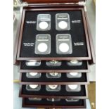 A twenty-eight coin collection of uncirculated silver dollars,