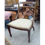 An Edwardian satinwood inlaid mahogany framed salon chair with a fan shaped back splat and an