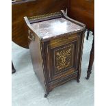 An Edwardian satinwood inlaid rosewood purdonium with a mottled marble top, over a fall flap,