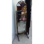 A modern Art Deco inspired cheval mirror,