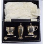 A set of three silver condiments Birmingham 1975 boxed CS