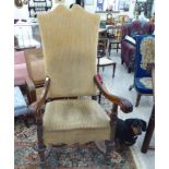 A late 19thC Continental walnut framed hall chair with a high back and open, scrolled arms,