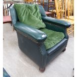 A 1920s stud upholstered green hide tub design library chair,