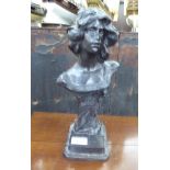 A 20thC cast and patinated bronze bust, on a stepped,