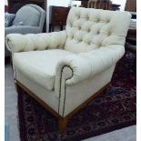 A Ralph Lauren cream coloured button upholstered hide easy chair,