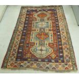 A Kasak rug with four shaped medallions,